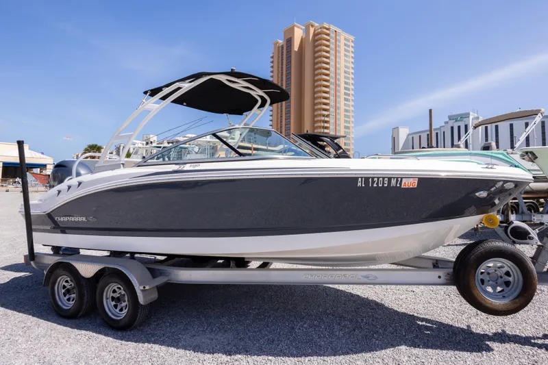 The Image of 2017 Chaparral 21 H2O Sport boat on trailer, cityscape background. - 0