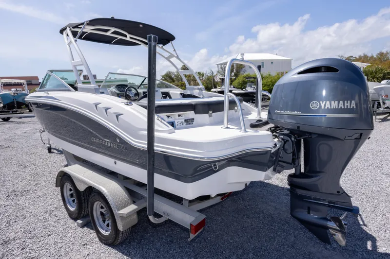 Slide: The Image of 2017 Chaparral 21 H2O Sport boat with Yamaha outboard motor on trailer. - 11