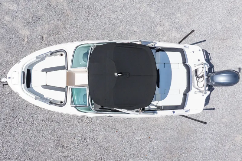 Slide: The Image of Overhead view of 2017 Chaparral 21 H2O Sport boat on gravel surface. - 5