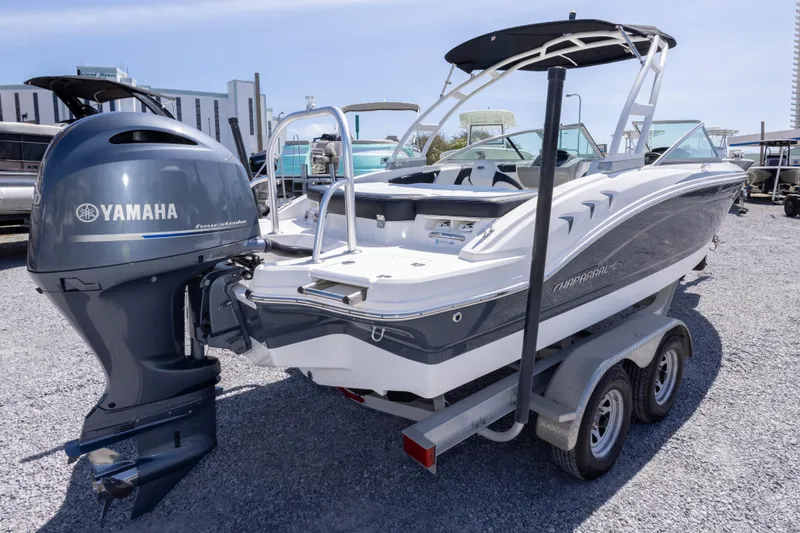 Slide: The Image of 2017 Chaparral 21 H2O Sport boat with Yamaha outboard motor on trailer. - 8