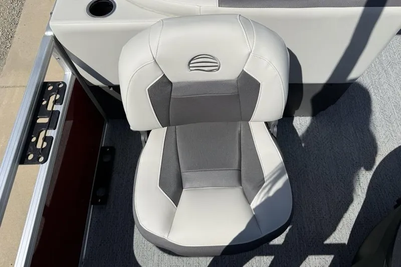 Slide: The Image of 2026 Sun Tracker Bass Buggy 18 DLX boat seat, gray and white upholstery, top view. - 17