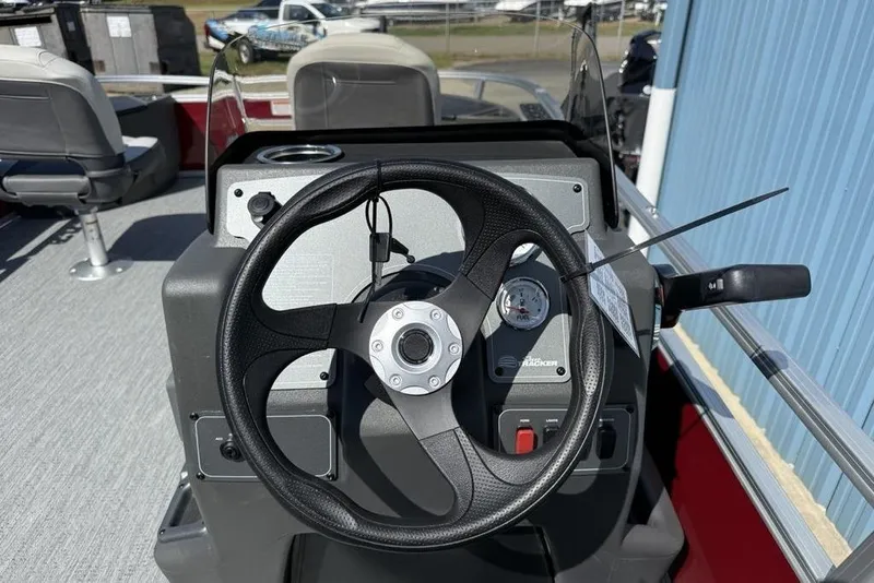 Slide: The Image of Steering console of 2026 Sun Tracker Bass Buggy 18 DLX pontoon boat. - 20
