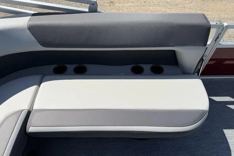 Slide: The Image of 2026 Sun Tracker Bass Buggy 18 DLX boat seat with cup holders, gray upholstery. - 21