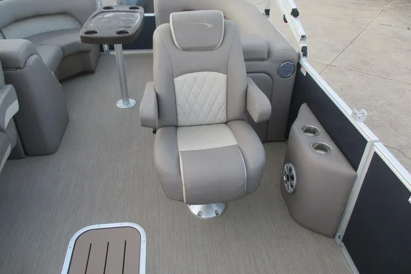 Slide: The Image of Luxurious seating on a 2018 Bennington 22SSRXP pontoon boat with cup holders and speaker. - 8