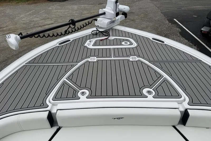 Slide: The Image of 2026 Tidewater 2500 Carolina Bay boat deck with sleek gray non-slip surface. - 13