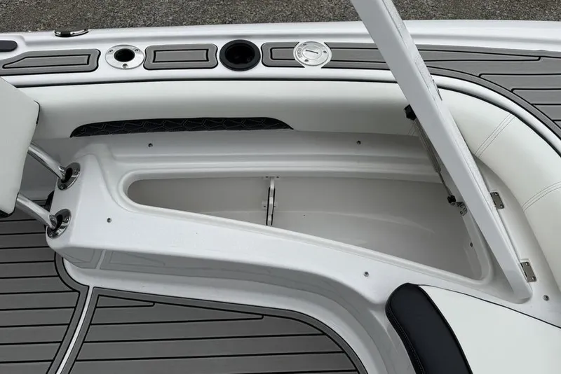 Slide: The Image of 2026 Tidewater 2500 Carolina Bay boat storage compartment with sleek design and modern features. - 15