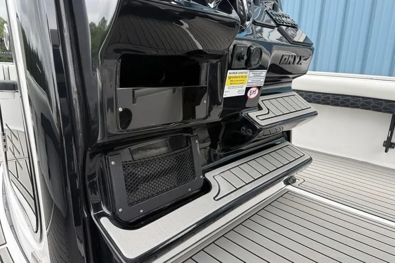 Slide: The Image of 2026 Tidewater 2500 Carolina Bay boat interior with sleek black finish and modern features. - 29
