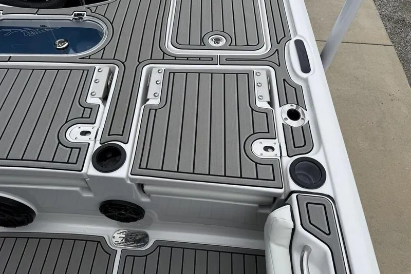 Slide: The Image of 2026 Tidewater 2500 Carolina Bay boat deck with sleek gray and black design. - 30