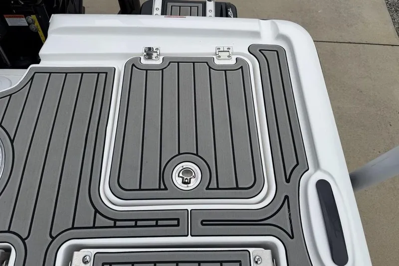Slide: The Image of 2026 Tidewater 2500 Carolina Bay boat deck with sleek, modern design and secure latch system. - 31