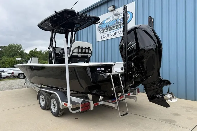 Slide: The Image of 2026 Tidewater 2500 Carolina Bay boat on trailer, displayed at Foothills Marine Center. - 4
