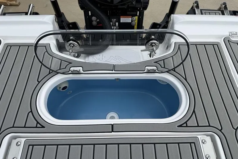 Slide: The Image of Livewell on 2026 Tidewater 2500 Carolina Bay boat, featuring sleek design and functionality. - 42