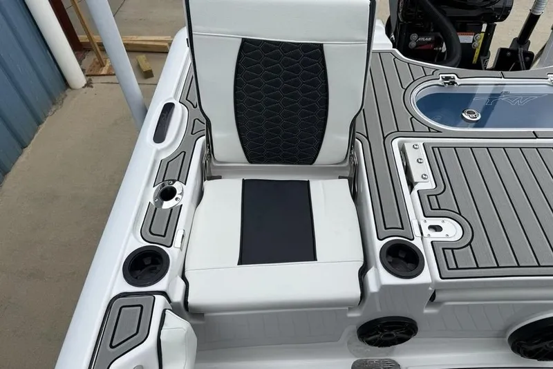 Slide: The Image of 2026 Tidewater 2500 Carolina Bay boat interior with sleek seating and modern design features. - 43