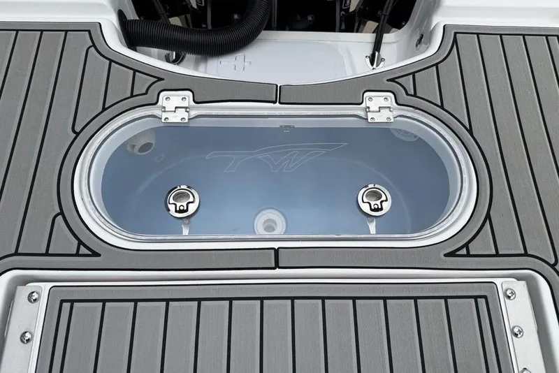 Slide: The Image of Livewell on 2026 Tidewater 2500 Carolina Bay boat with sleek deck design. - 46
