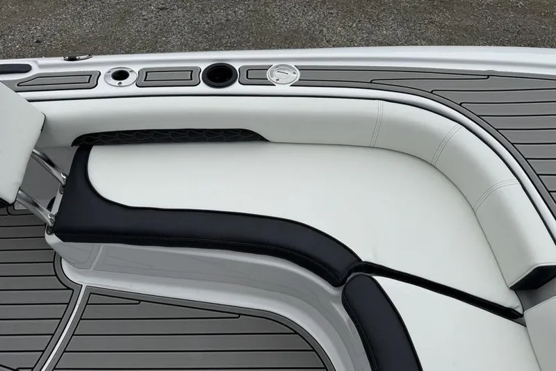 Slide: The Image of 2026 Tidewater 2500 Carolina Bay boat interior with sleek seating and modern design. - 6