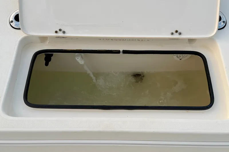 Slide: The Image of Livewell on a 2009 ShearWater 2400Z boat, filled with water. - 29