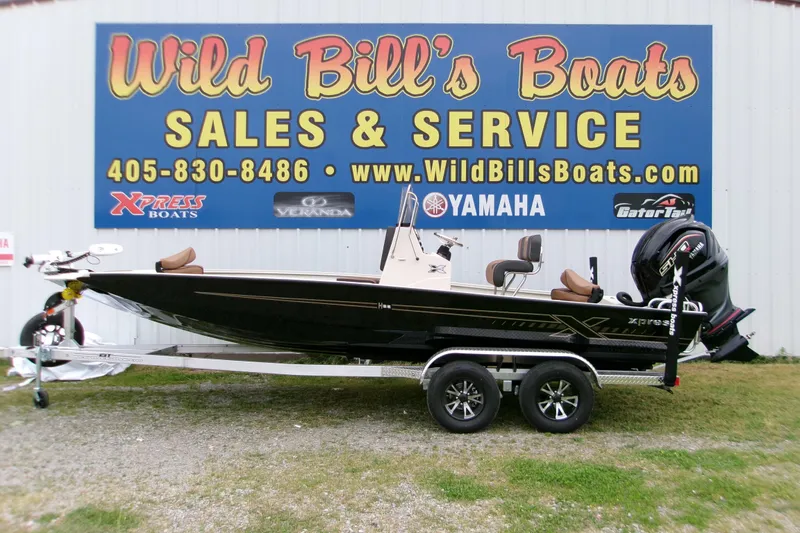 The Image of 2026 Xpress H22B Bay boat on trailer at Wild Bill's Boats dealership. - 0