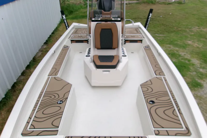 Slide: The Image of 2026 Xpress H22B Bay boat interior with stylish seating and deck design. - 18