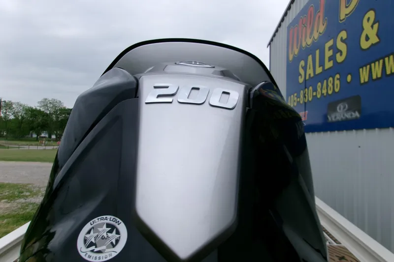 Slide: The Image of Outboard motor with "200" label on a 2026 Xpress H22B Bay boat. - 2