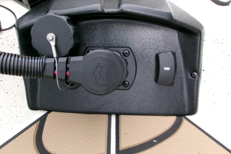 Slide: The Image of Control panel of 2026 Xpress H22B Bay boat with trim switch and cable connections. - 21