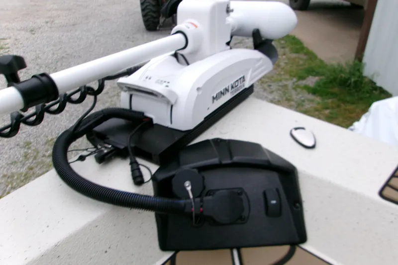 Slide: The Image of Minn Kota trolling motor on 2026 Xpress H22B Bay boat deck. - 23