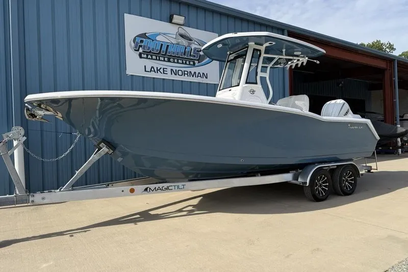 Slide: The Image of 2026 Tidewater 232 LXF boat on trailer at Foothills Marine Center, Lake Norman. - 11