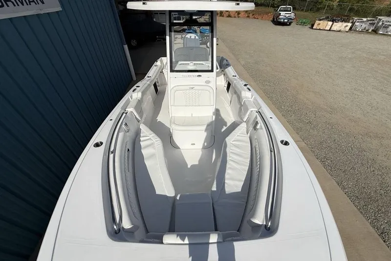 Slide: The Image of 2026 Tidewater 232 LXF boat with sleek white interior and modern design. - 18