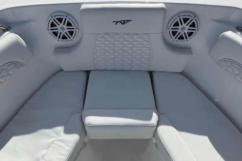 Slide: The Image of Luxurious seating area on 2026 Tidewater 232 LXF boat with stylish speakers. - 7