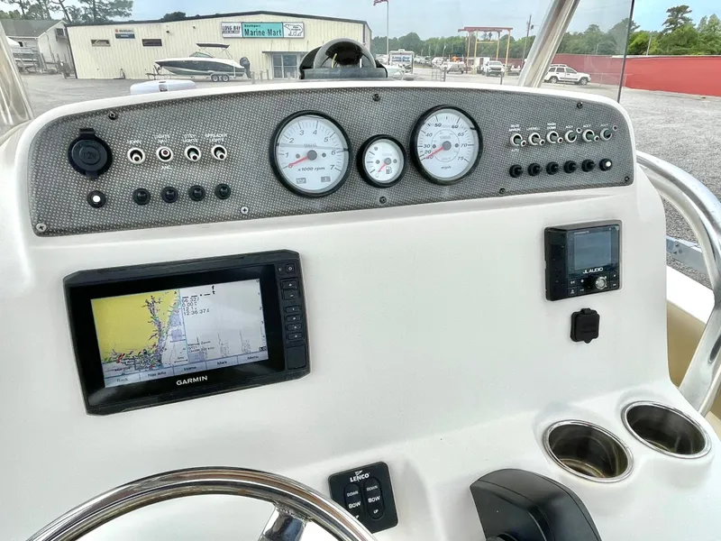 Slide: The Image of Dashboard of a 2020 Pioneer 202 Sportfish boat with Garmin navigation system. - 14