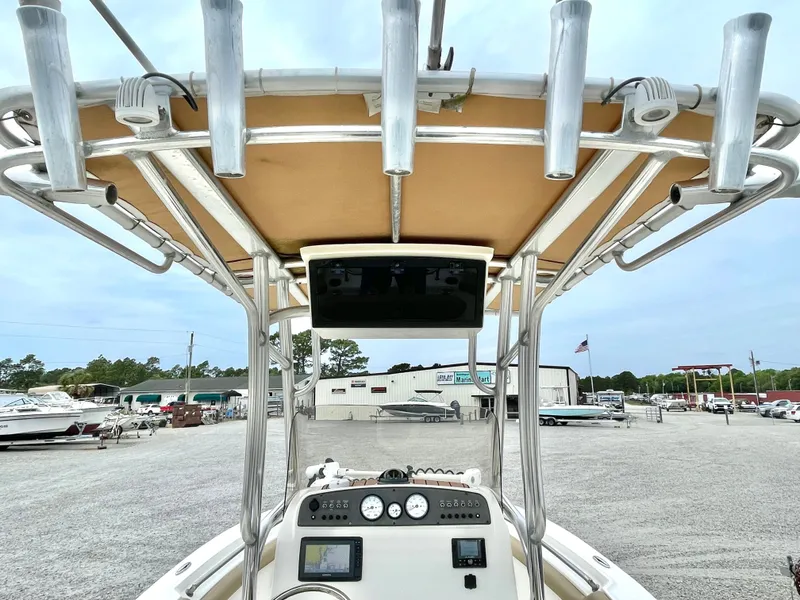 Slide: The Image of Pioneer 2020 202 Sportfish boat with helm console and fishing rod holders. - 15