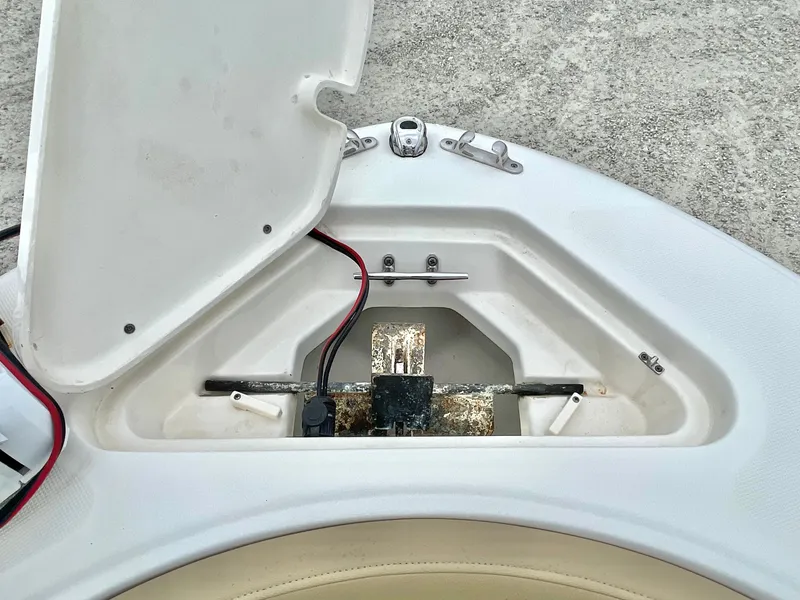 Slide: The Image of Anchor compartment of a 2020 Pioneer 202 Sportfish boat. - 26