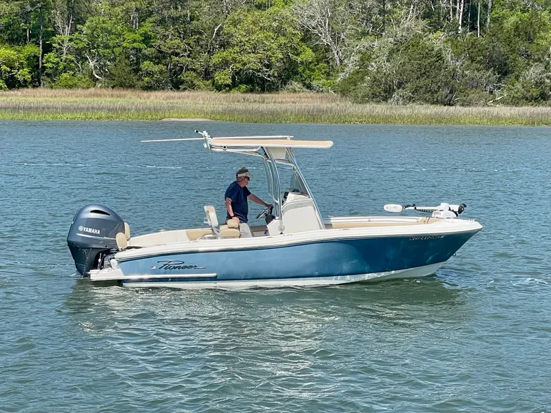Slide: The Image of 2020 Pioneer 202 Sportfish boat on calm water. - 3