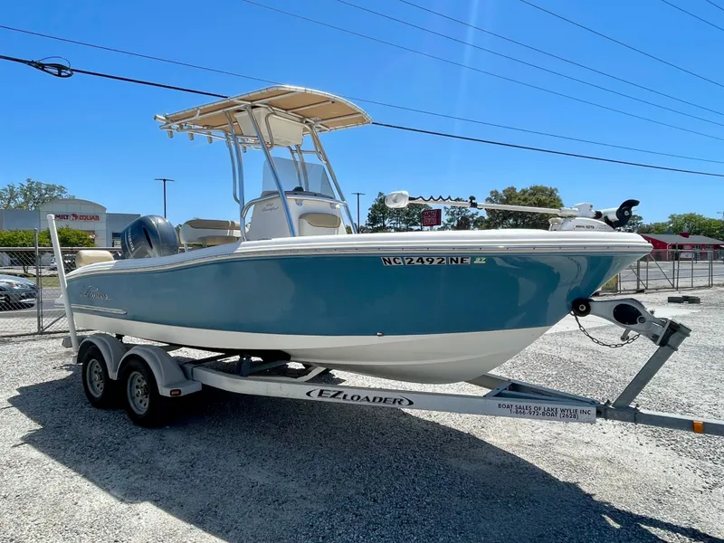 Slide: The Image of 2020 Pioneer 202 Sportfish boat on trailer outdoors. - 4