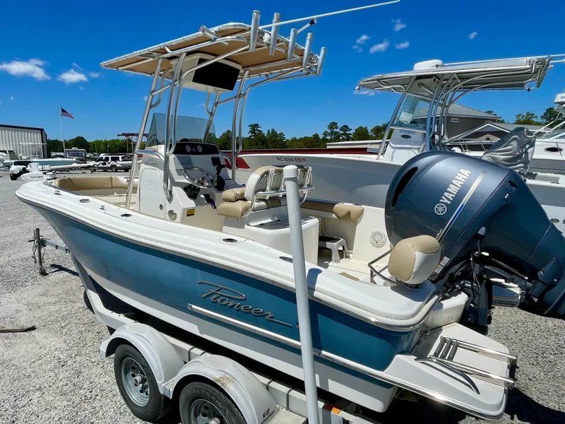 Slide: The Image of 2020 Pioneer 202 Sportfish boat with Yamaha engine outdoors. - 6