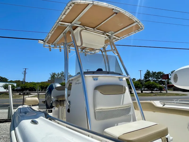 Slide: The Image of Pioneer 2020 202 Sportfish boat with T-top and helm console. - 9
