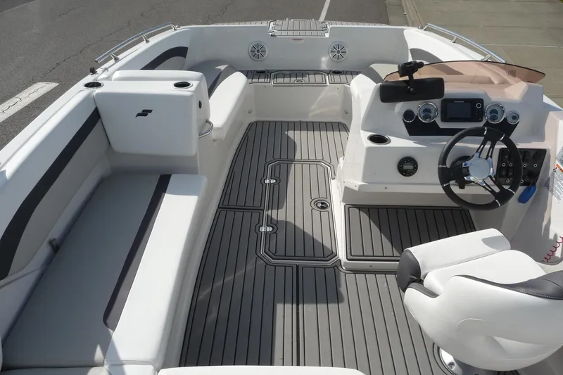 Slide: The Image of 2022 Starcraft SVX 171 OB boat interior with modern helm and seating. - 14