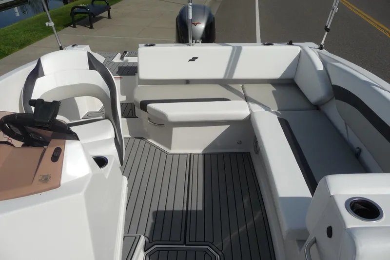 Slide: The Image of 2022 Starcraft SVX 171 OB boat interior with sleek seating and modern design. - 16