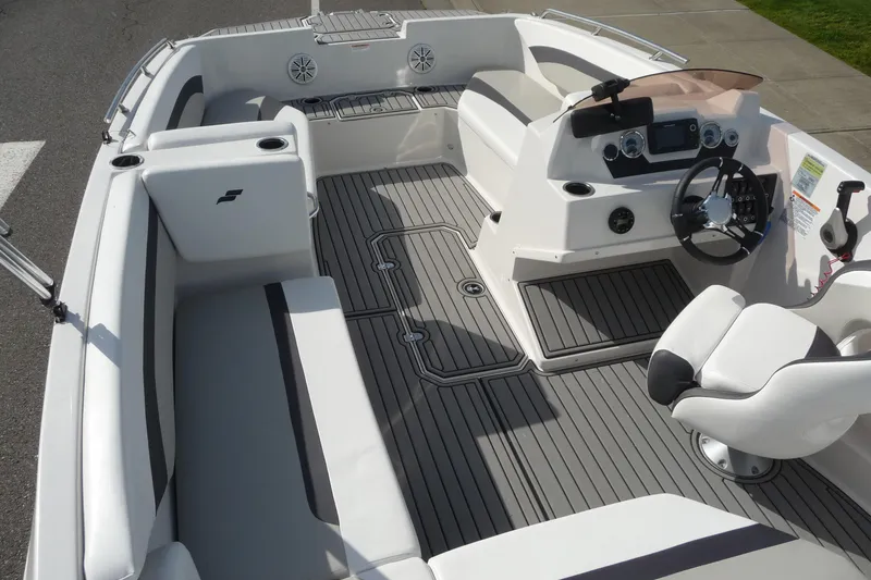 Slide: The Image of 2022 Starcraft SVX 171 OB boat interior with modern seating and steering console. - 20