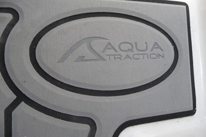 Slide: The Image of AquaTraction logo on Starcraft SVX 171 OB 2022 boat flooring. - 22