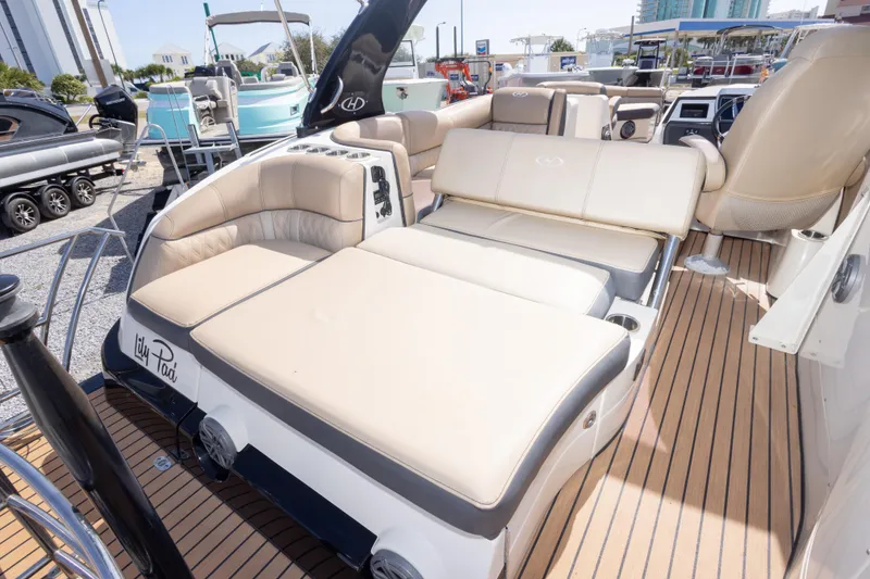 Slide: The Image of 2016 Harris Crowne 250 boat with luxurious seating and sleek design on display. - 22
