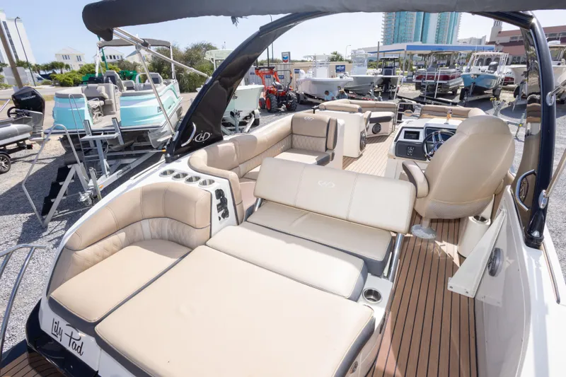 Slide: The Image of Luxurious 2016 Harris Crowne 250 boat with spacious seating and modern amenities. - 23