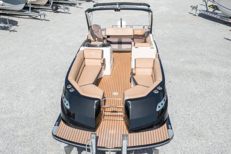 Slide: The Image of 2016 Harris Crowne 250 pontoon boat with luxurious seating and sleek design. - 33