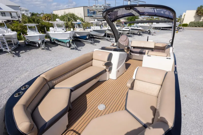 Slide: The Image of 2016 Harris Crowne 250 pontoon boat with luxurious seating and sleek design. - 34