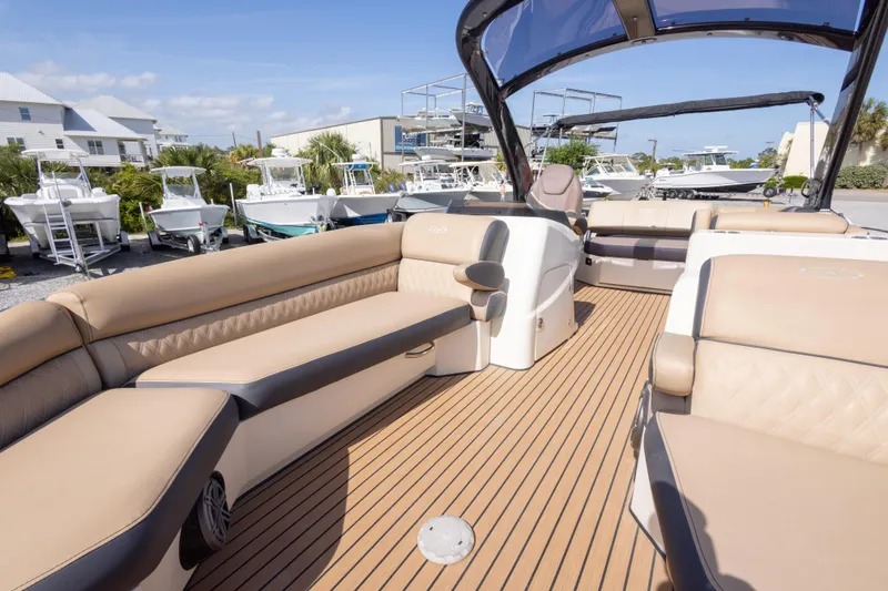 Slide: The Image of Luxurious 2016 Harris Crowne 250 pontoon boat with spacious seating and elegant design. - 36