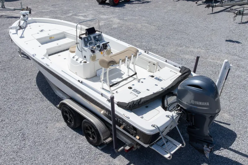 Slide: The Image of 2017 NauticStar 2400 Sport boat with Yamaha engine on a trailer. - 38