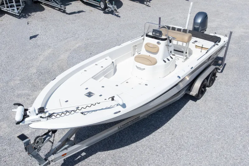 Slide: The Image of 2017 NauticStar 2400 Sport boat on trailer, featuring sleek design and modern amenities. - 39