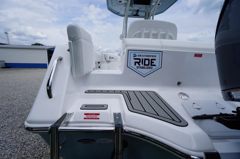 Slide: The Image of 2026 Tidewater 232 SS boat with Seakeeper Ride stabilization, featuring sleek design and modern features. - 75