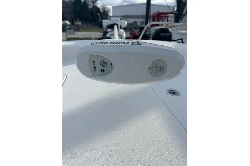 Slide: The Image of Minn Kota Riptide trolling motor on 2011 Carolina Skiff 258 DLV boat deck. - 11