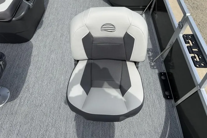 Slide: The Image of 2026 Sun Tracker Bass Buggy 16 XL Select boat seat, featuring gray and white upholstery. - 11