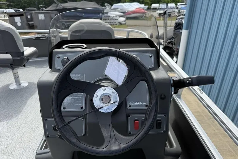 Slide: The Image of Steering console of 2026 Sun Tracker Bass Buggy 16 XL Select pontoon boat. - 27