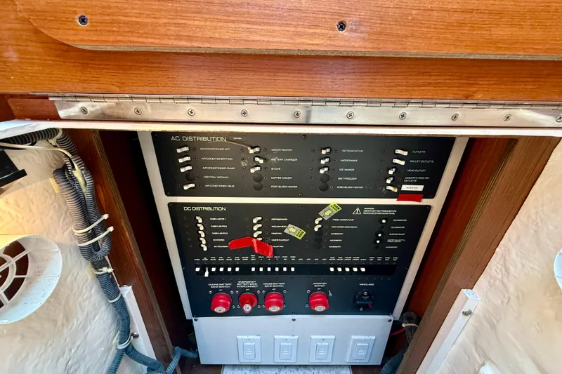 Slide: The Image of Electrical control panel on a 2006 Tiara Yachts 3600 Sovran boat. - 17